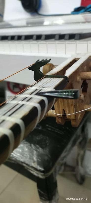 Xerek, Tarın kəllə xərəyi, "Maral başı" Rast musiqi alətləri