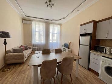 Bayılda yerləşən ümumi sahəsi 100 kv,m olan,2 otaqlı əla təmirli