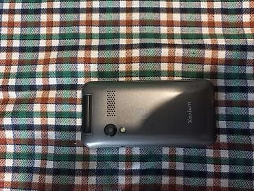 mobil telfonlar: Philips Xenium qapaqlı mobil telefon 10.15 gundu alnib tezdi demek — 3