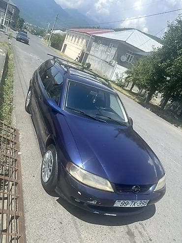 46 kuza: Opel Vectra Caravan (Universal), tünd mavi rəng. Xüsusiyyətlər: - — 8