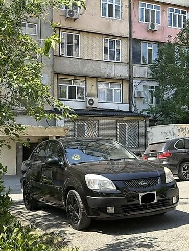 diskilər: Kia Rio: 1.4 l | 2008 il Sedan — 10