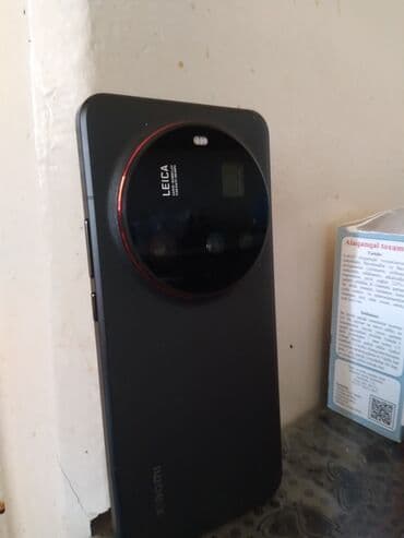 xiaomi 15 qiyməti: Xiaomi 15 Ultra, 512 GB, rəng - Qara, 
 Sensor, Barmaq izi, Simsiz şarj — 4