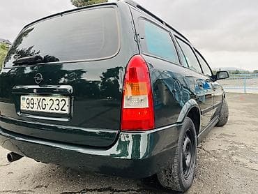masin bmw: Opel Astra: 1.6 l | 1998 il 406000 km Universal — 2
