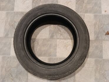 disiqi teker: İşlənmiş Şin Continental 215 / 55 / R 18 — 4