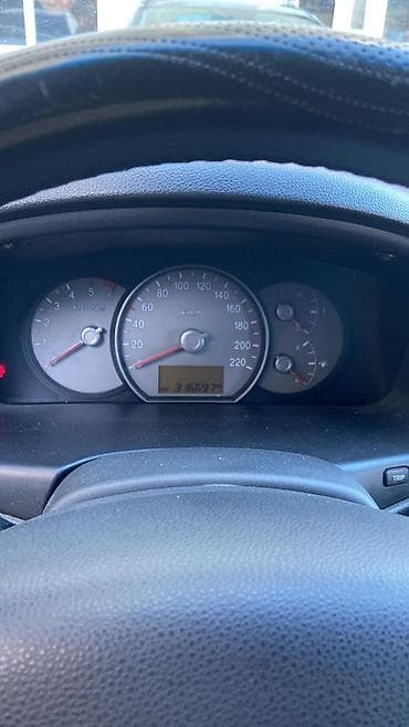 Aksesuarlar və tüninq: Kia Carens CRDi – dizel, avtomat - Kuzov: tünd mavi, 5 qapı — 4