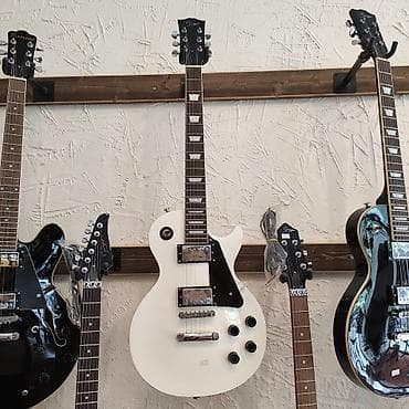 gitara temiri: Elektro-gitara Smiger L-G9 WH Simlərin sayı: 6 Üst: Ağcaqayın Qol: Gül — 1