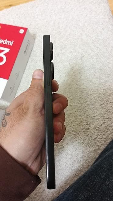 Xiaomi Redmi 13 – 128 yadas 10 gunun telfondu tecili satilir hec bir