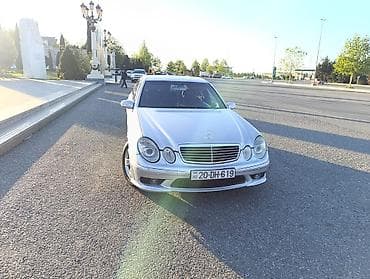mersedes spoyler: Mercedes-Benz E-Class sedan (W211), gümüşü rəng. Xüsusiyyətlər: - — 3