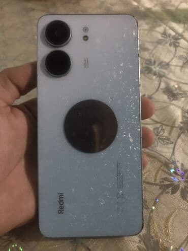 redmi note 15 pro max qiyməti: Redmi markalı smartfon. Telefonun arxa tərəfində "Redmi" loqosu və — 3
