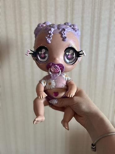 oyuncaq aparat: Kukla Glitter Babyz Lila MGA. Bu cazibədar kuklaların parlaq saçları — 2