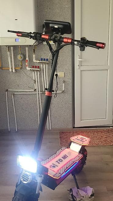 ucuz gitara: Elektrik skuter – TOMI brendi Xüsusiyyətlər: - Güclü ikili — 2