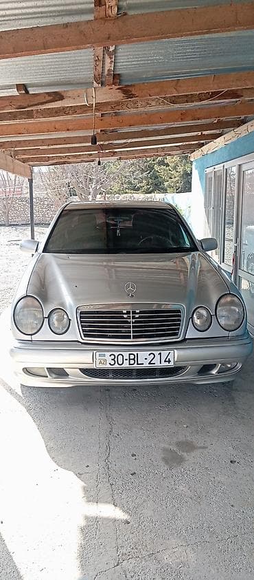 Mercedes-Benz E-Class E230 (W210) – gümüşü sedan Xüsusiyyətlər: -
