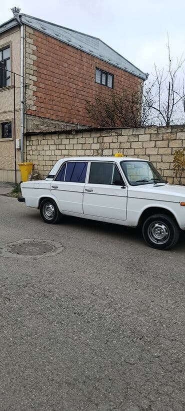 ваз 2111: VAZ 2106, ağ rəng, sedan kuzov. Klassik “Jiquli” znaki. ij təkərlər — 4