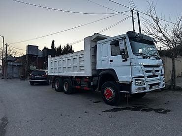 cadir masin: Ağ rəngli 6x4 tipli ağırtonnajlı samosval yük maşını. Texniki — 4