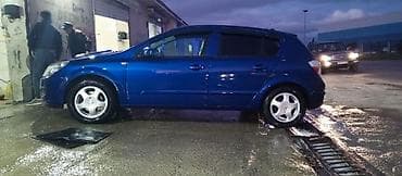 turbo az opel astra 2015: Opel Astra H – mavi rəng, sedan/hetçbek kuzov (ön görünüş). Nömrə — 5