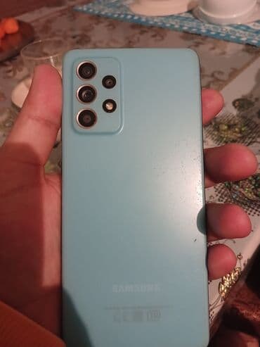 Apple iPhone: Samsung Galaxy A52 — 1