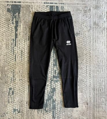 the ordinary mehsullari: Errea tərəfindən istehsal olunan bu ağ rəngli polo köynək idman — 4