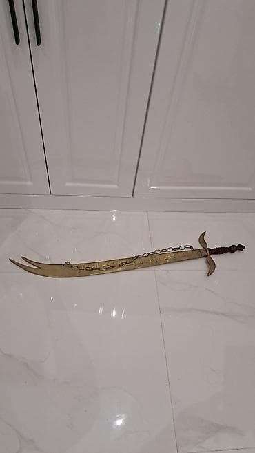 Məhsul: Dekorativ şərq üslublu qılınc - Material: metal bıçaq, metal