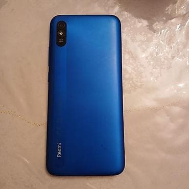 redmi note 8 ekranı: Xiaomi Redmi smartfon - Model: Redmi A seriyası (şəkildə mavi arxa — 2
