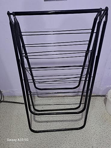 Qatlana bilən paltar qurudan asqı - Material: metal konstruksiya lalafo.az -da Qatlana bilən paltar qurudan asqı - Material: metal konstruksiya
