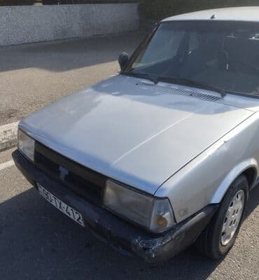 tofaş satış: Tofaş Şahin/Doğan (sedan) – gümüşü rəng Xüsusiyyətlər: - Kuzov: 4 — 7