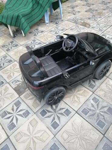 Uşaqlar üçün nəzərdə tutulmuş qara rəngli elektrikli maşın. Bu model lalafo.az -da Uşaqlar üçün nəzərdə tutulmuş qara rəngli elektrikli maşın. Bu model