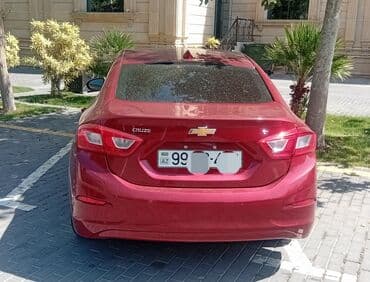 yağış sensoru: Chevrolet Cruze sedan – qırmızı (metalik) rəngdə, 4 qapı, arxa “CRUZE” — 2