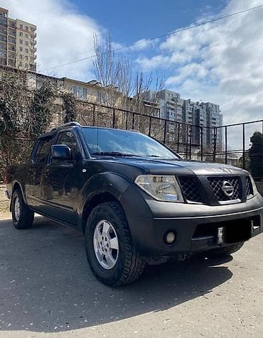 Nissan Navara: 2.5 л | 2012 г. Пикап — 1