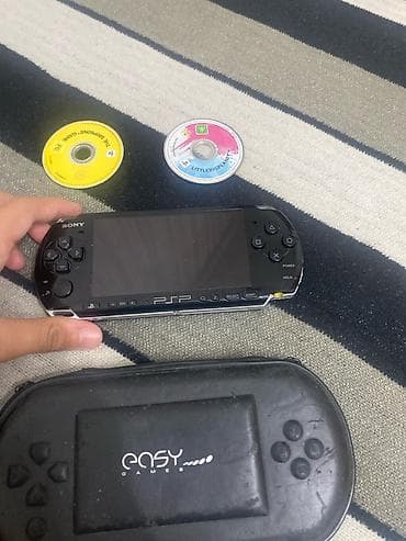 psp 2000: Ekranı təmizdir, cızıq yoxdur. Batareyası və adapteri olmadığı üçün — 10