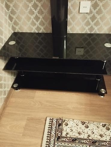 metbext mebil: Televizor altlığı 
Qara şüşə 
Yaxşı vəziyyətdədi
20Azn — 4