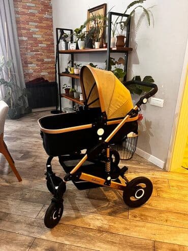 qara koynək: Çıxarıla bilən beşikli araba — 1