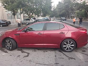 e39 radiator: Kia Optima sedan – qırmızı rəng - Kuzov: 4 qapılı sedan, idman üslublu — 6