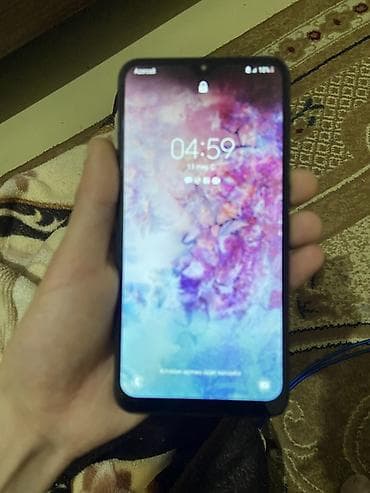 samsung galaxy watch active 2: Samsung Galaxy A10, 32 GB, rəng - Qara, İki sim kartlı — 1