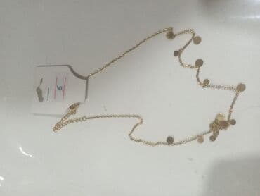 Свадебные платья и аксессуары: Zərgərlik dəsti – qızılı rəng aksesuarlar Tərkib: - Boyunbağı 1: incə — 3