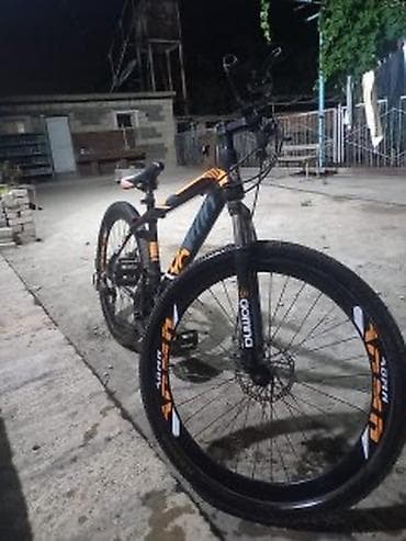 akustik gitara satisi: MTB tipli dağ velosipedi - Rənglər: qara–narıncı aktsentlərlə - — 2
