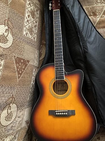 Akkustik gitar dəsti - Korpus: kəsikli (cutaway) akustik gövdə