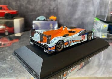 где можно продать марки: Коллекционная модель Aston Martin AMR-One #7 Gulf Team LeMans 2011 — 16