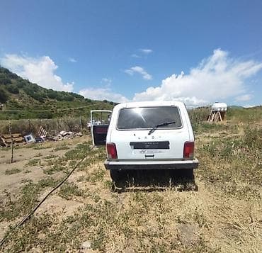 nissan tiida yan guzgu: VAZ (LADA) 4x4 Niva: 1.7 l | 1999 il 153624 km Sedan — 2