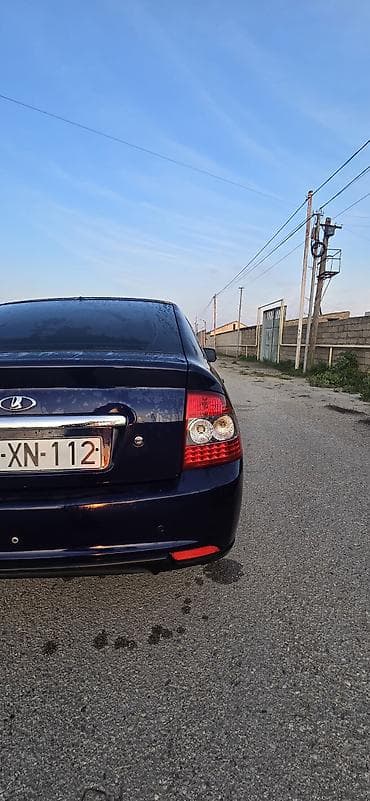 ВАЗ (ЛАДА): Lada Priora hetçbek – tünd mavi rəng Xüsusiyyətlər: - Kuzov: 5 qapılı — 4