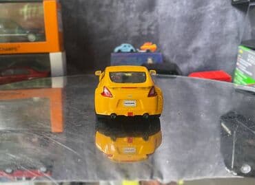 metbex tavan modelleri: Коллекционная модель Nissan 370Z Z34 yellow 2008 DeAgostini Scale — 7
