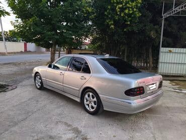 w210 kompressor: Mercedes-Benz E 220: 2.2 l | 2002 il Sedan — 9