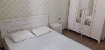 tam temirli menziller: İnşaatçılar metrosunun çıxısında inşaat binasında 12 mertebeli — 11