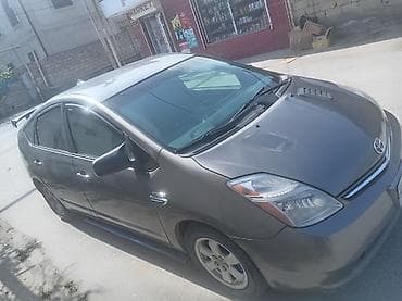 Toyota: Toyota Prius II (hibrid) – 5 qapılı liftbek Xüsusiyyətlər: - Hibrid — 2