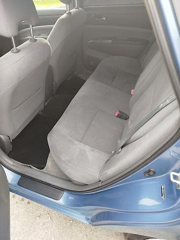 ilkin odənişsiz avtomobil: Toyota Prius, mavi rəng, 5 qapılı hatchback, hibrid. - Yüngül lehimli — 6