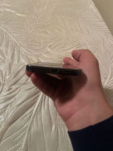 es 23 telefon: Samsung Galaxy S23, rəng - Qara, Barmaq izi — 2