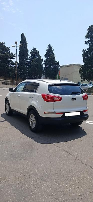 Kia Sportage: 2 л | 2013 г. Внедорожник — 4