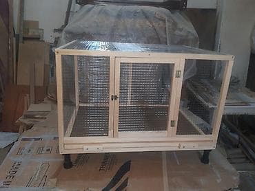 Teze tixilma boyuk olculu qefesler.alti setka ustu padnoslu ve yerden