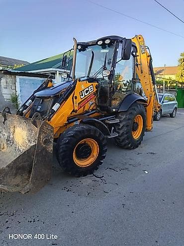 moto kasqa: JCB 3CX ekskavator-yükləyici - Universal ikiqat funksiyalı texnika — 1