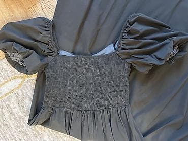 Qara rəngli qadın donu - Dizayn: Midi/uzun ölçüdə, A-kəsimli ətək — 2