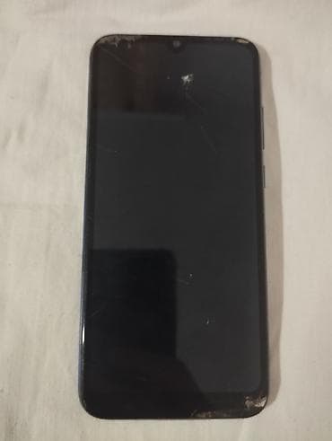 telefon: Huawei smartfon (mavi korpus) Xüsusiyyətlər: - Arxa barmaq izi — 2